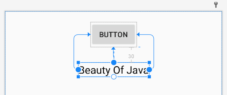 Текст TextView расположен с ограничениями относительно кнопки Button в ConstraintLayout